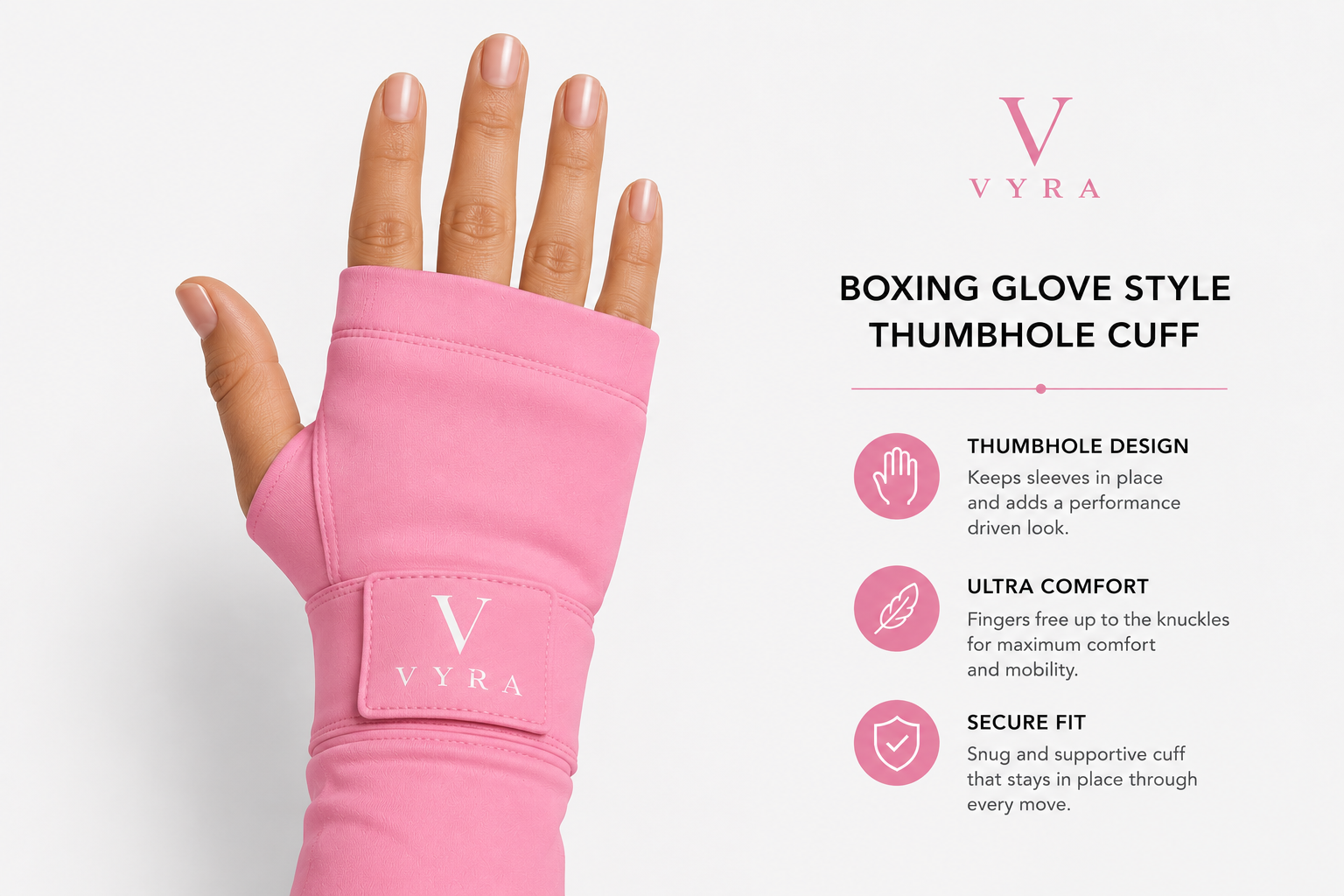 A pink boxing glove style thumbhole cuff worn on a hand, shown against a light gray background with product text and feature callouts on the right. The cuff has a visible VYRA logo patch.